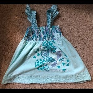 A naartjie kids 6 years girls shirt.